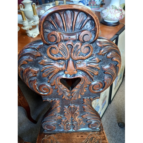 594 - Pair of greenmail oak carved hall chairs with bobbin turned legs ( split on both seats )