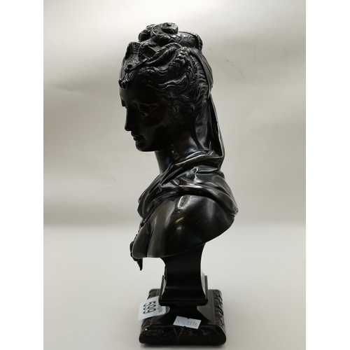 599 - A Bronze Bust of a lady 27cm high