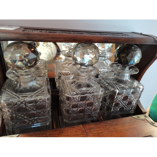 624 - Antique oak tantalus (2 x  bottles chipped )