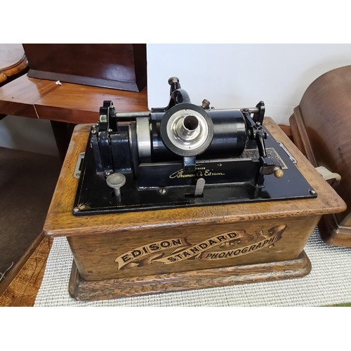 645 - EDISON standard phonograph with quantity of music rolls ( 23)