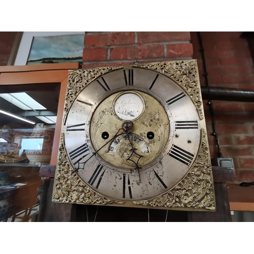 672 - An early oak grand father clock by William Pridgin of Hull marked 1740 and having a glass bulls eye ... 