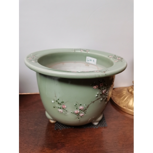 650e - A Chinese green floral vase with character marks and decoration