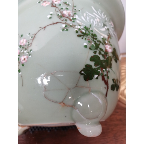 650e - A Chinese green floral vase with character marks and decoration