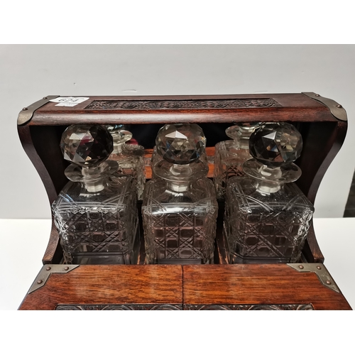 624 - Antique oak tantalus (2 x  bottles chipped )