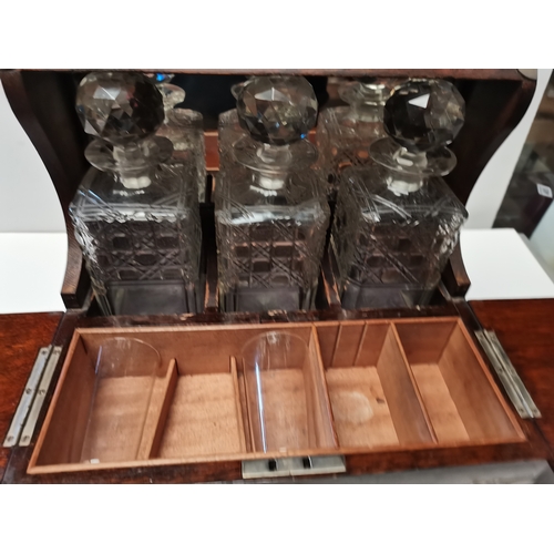 624 - Antique oak tantalus (2 x  bottles chipped )