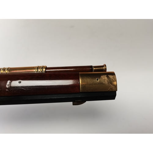 25 - Reproduction Rifle and Shot flask