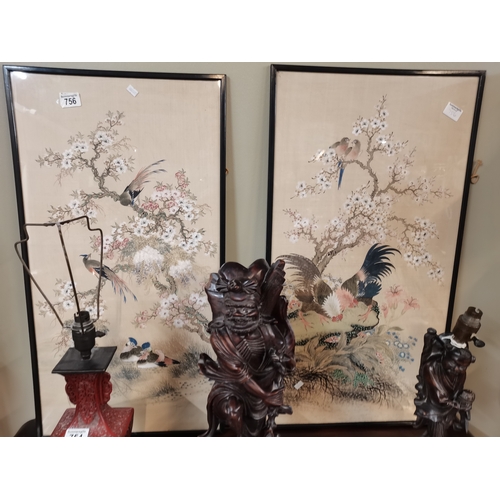 756 - A pair of Chinese silk watercolour paintings of birds in trees