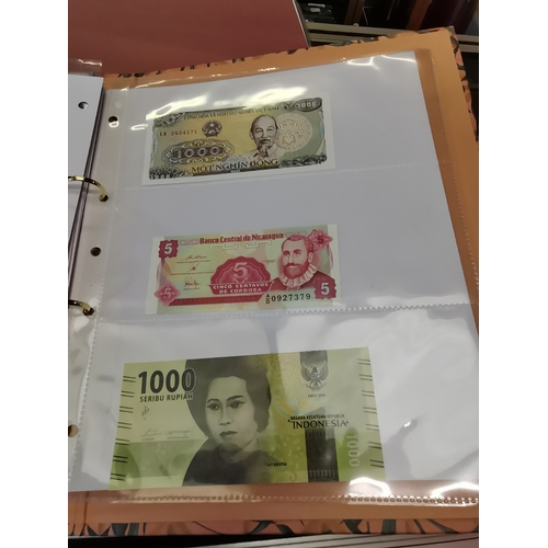 503 - X2 albums of world banknotes 1) Uncirculated 2) Circulated