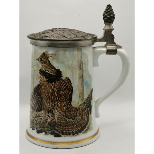 11 - A limited edition Franklin Porcelain game bird stein, 'The Ruffed Grouse, the hinged cover with foli... 