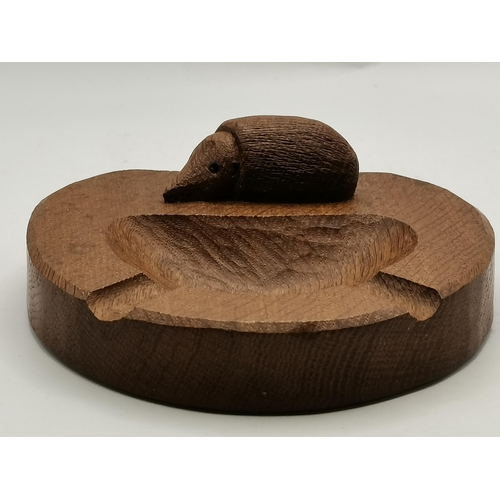 115B - Nick Hill, a Hedgehogman oak ashtray, horseshoe shaped, with carved hedgehog signature. 12cm by 12.6... 