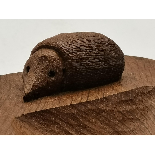 115B - Nick Hill, a Hedgehogman oak ashtray, horseshoe shaped, with carved hedgehog signature. 12cm by 12.6... 