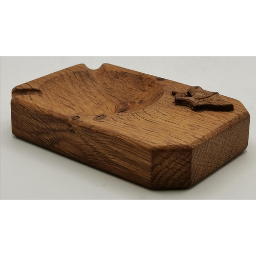 115C - Alan Grainger, an Acornman oak ashtray, of typical form, with carved acorn signature; together with ... 