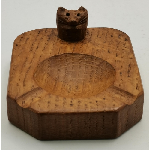 115G - Malcolm Pipes, a Foxman oak ashtray, of typical form, with carved fox head signature; together with ... 