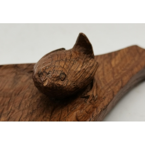 115H - Bob Hunter, a Wrenman oak ashtray, of naturalistic shape, adzed, with carved wren signature. 14.5cm ... 