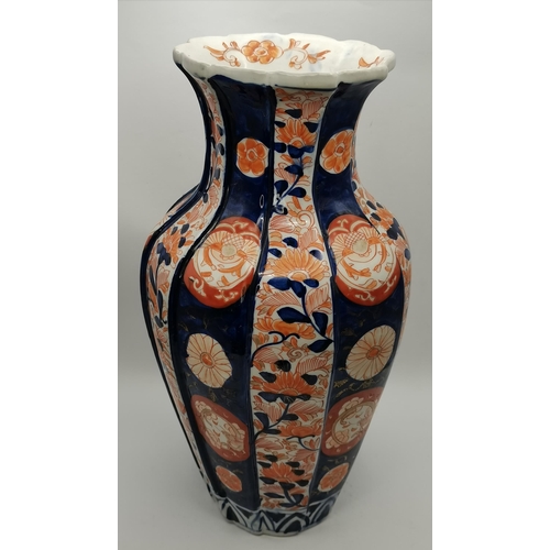 117 - Imari Fluted & Lobed Vase. the sides are decorated in typical Imari palette of blues and reds foliat... 