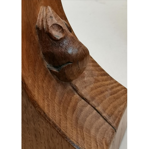 126 - Robert Thompson, a pair of Mouseman oak book ends, rectangular, lightly adzed, the curved sides each... 