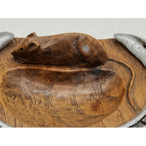 127 - Robert Thompson, a Mouseman oak pin dish, circular with a straight top side, fitted with a horseshoe... 