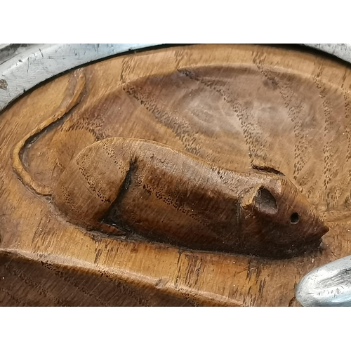 127 - Robert Thompson, a Mouseman oak pin dish, circular with a straight top side, fitted with a horseshoe... 