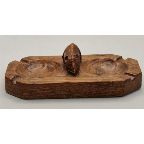 128 - Robert Thompson, a Mouseman oak twin ashtray, rectangular with canted corners, twin bowls with four ... 