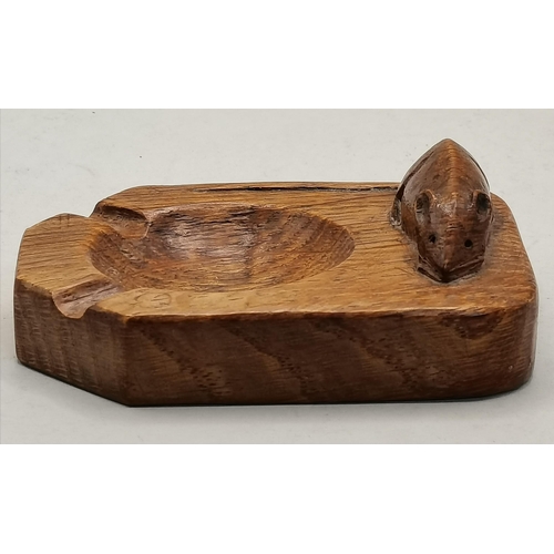 130 - Robert Thompson, a Mouseman oak ashtray, of typical form, rounded rectangular with two canted corner... 