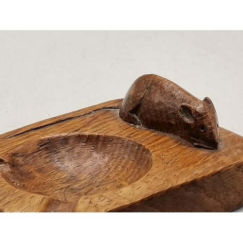 130 - Robert Thompson, a Mouseman oak ashtray, of typical form, rounded rectangular with two canted corner... 