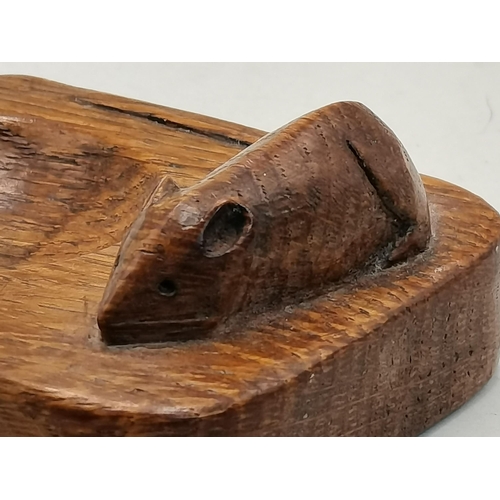 130 - Robert Thompson, a Mouseman oak ashtray, of typical form, rounded rectangular with two canted corner... 