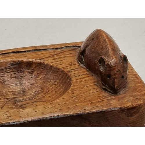 130 - Robert Thompson, a Mouseman oak ashtray, of typical form, rounded rectangular with two canted corner... 