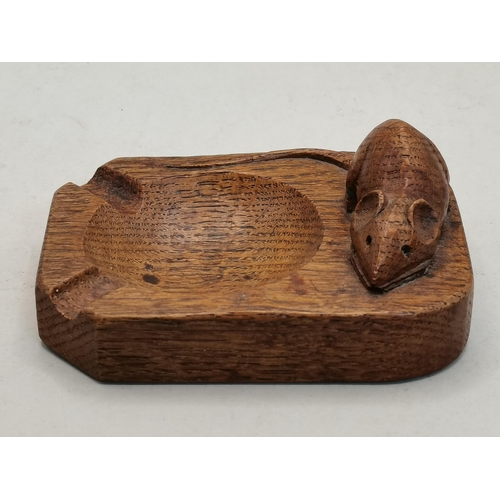 131 - Robert Thompson, a Mouseman oak ashtray, of typical form, rounded rectangular with two canted corner... 