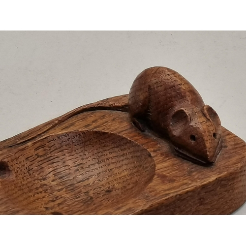 131 - Robert Thompson, a Mouseman oak ashtray, of typical form, rounded rectangular with two canted corner... 