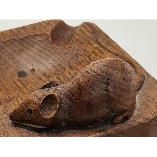 131 - Robert Thompson, a Mouseman oak ashtray, of typical form, rounded rectangular with two canted corner... 