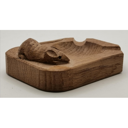 141a - Robert Thompson, a Mouseman oak ashtray, of typical form, with carved mouse signature. 10.21cm by 7.... 