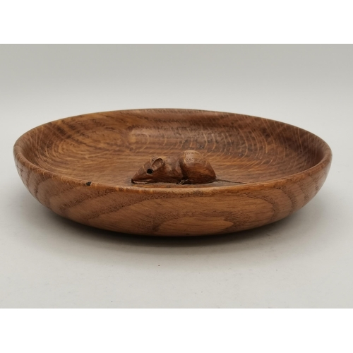 143 - Robert Thompson, a Mouseman oak nut dish, shallow circular, lightly adzed to interior, with carved m... 