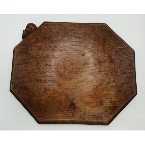 144 - Robert Thompson, a Mouseman oak bread board, elongated octagonal, lightly adzed, with carved mouse s... 