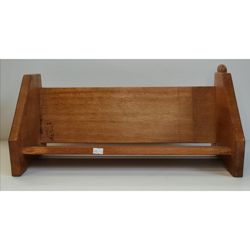 148 - Peter Heap, a Rabbitman oak book trough. 20.3cm high, 47.7cm wide, 20.6cm deep (Mouseman interest)