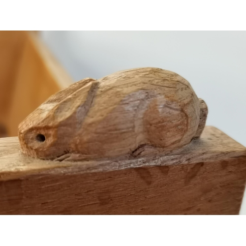 148 - Peter Heap, a Rabbitman oak book trough. 20.3cm high, 47.7cm wide, 20.6cm deep (Mouseman interest)