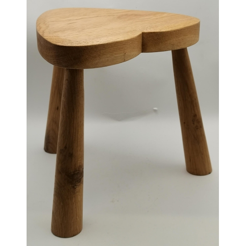 149 - A pair of oak milking stools, of small proportions, with heart-shaped seats. (2) Approx. 21cm high