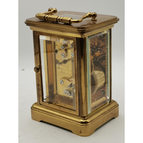 17 - A Matthew Norman Carriage Clock in Brass with box and key - H11cm