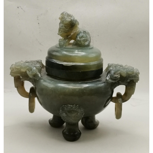 2 - A Chinese jade censer of characteristic shape, with zoomorphic ring handles, raised on pad feet, the... 