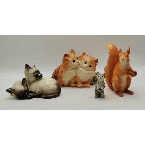 22 - A collection of Beswick animals - ginger Persian Kittens, Siamese Kittens, Kitten with music book an... 