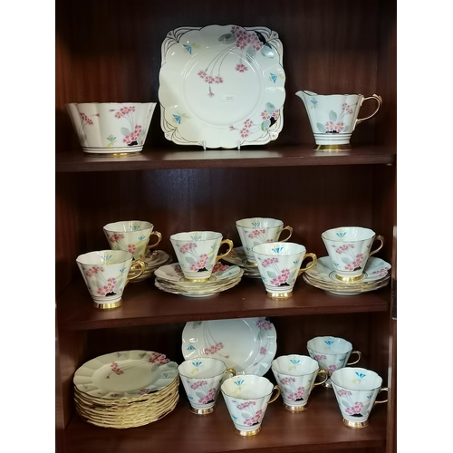 34 - Tuscan China Tea set in 'Plant' pattern - includes Cake plates, Sugar Bowl, Milk Jug, 11 Cups, 12 sa... 