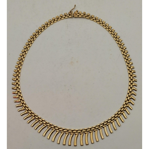 344B - A 9ct gold fancy necklace, the brick-link chain with graduated fringing, stamped '375' and hallmarke... 