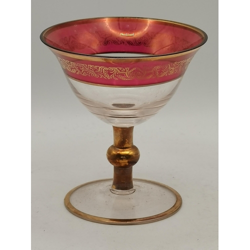 43 - x2 boxes of 6 Vintage Bohemian Cranberry glasses with gilt gold edging.