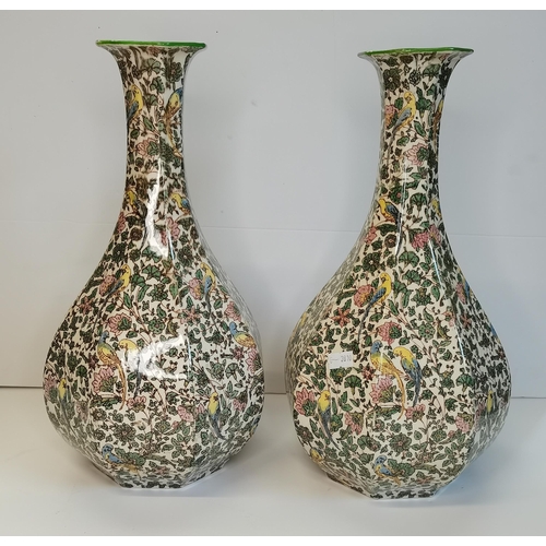 58 - A Pair of Royal Doulton Large Bottle Vases - in the 'Persian' Design incorporating exotic birds amon... 