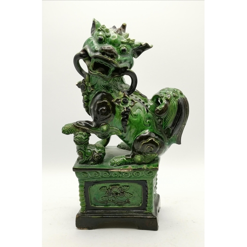 7 - Chinese Foo dog green glazed pottery - slight damage - H26cm