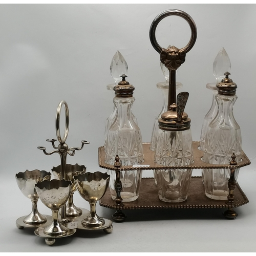 333 - A Victorian silver-plated cruet stand by Fattorini & Sons Ltd, rectangular with canted corners and b... 