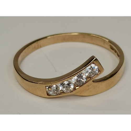 342 - A 9ct gold with diamond cross over style ring size