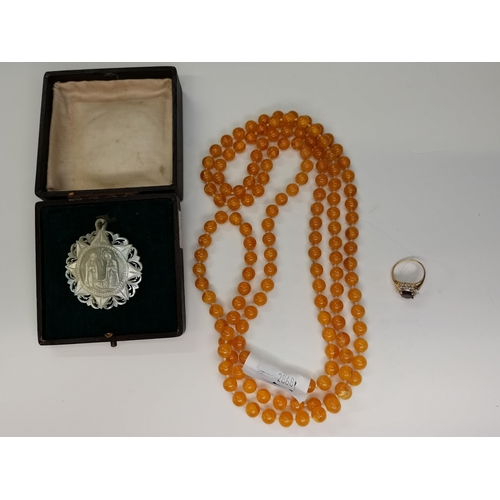 342b - Carved Pendant (poss Mother of Pearl) & Amber beaded necklace 136cm length