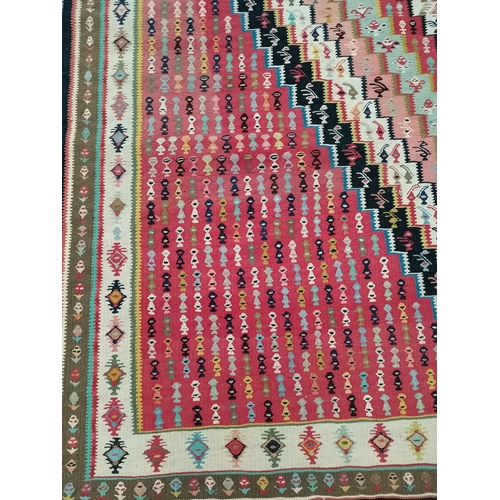 916 - A multicoloured rug 2m x 2m