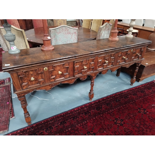 908 - An Eric Gott of Pickering hand made pippy oak Jacobean style 2.1m cx 50cm dresser with opening top m... 