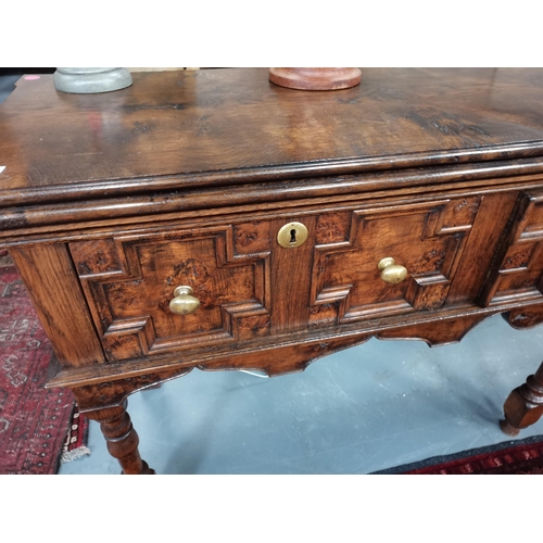 908 - An Eric Gott of Pickering hand made pippy oak Jacobean style 2.1m cx 50cm dresser with opening top m... 